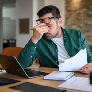 Debt management tools including calculator, payment plan chart, and money elements arranged for BudgetTap financial education blog.